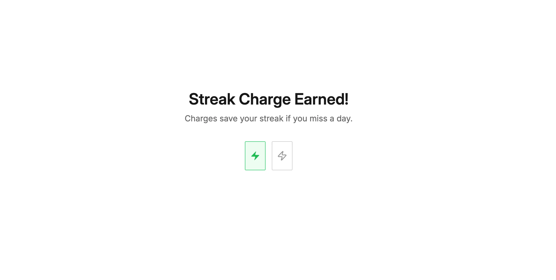 Streak charge earned celebration showing one active charge and one empty charge